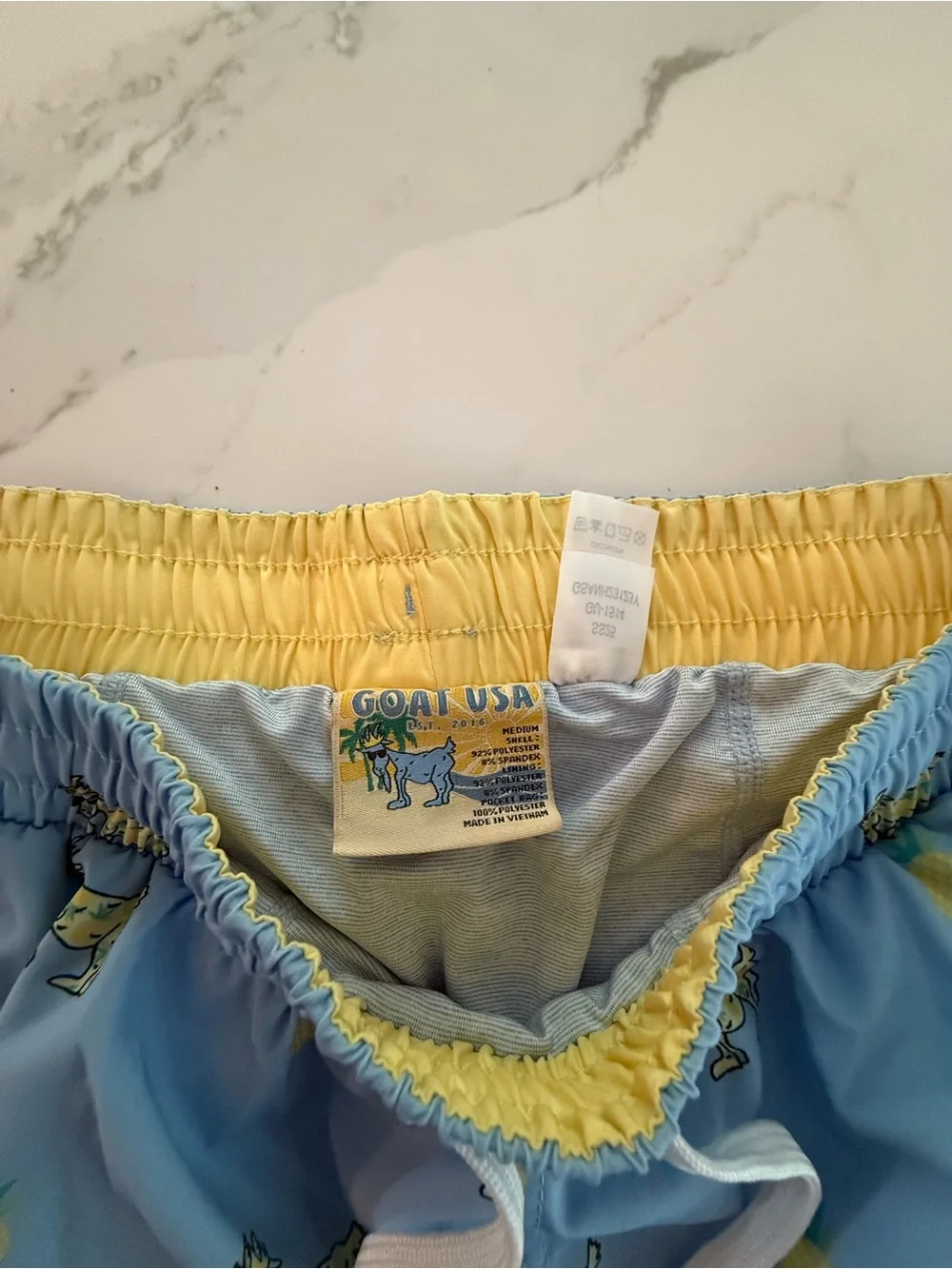Men's Light Blue Pineapple & Goat Print Swim Trunks